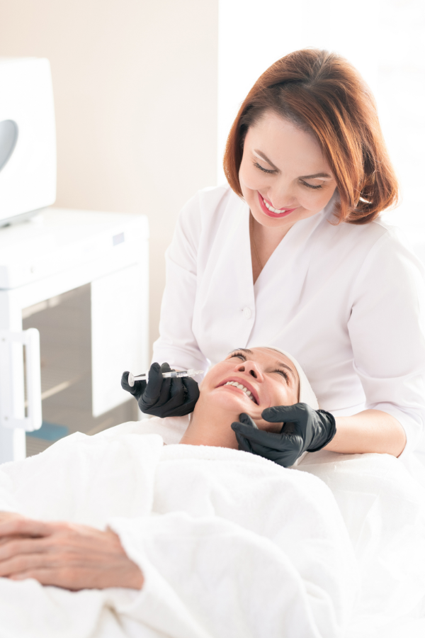 Woman getting a cheek filler