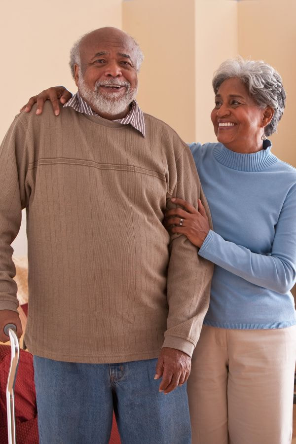 image of an elderly couple smiling together