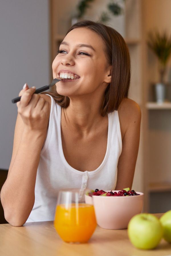 image of a woman in her kitchen after iv therapy increased her energy levels